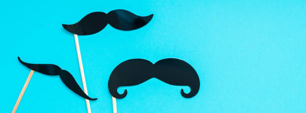 istock Paper moustaches for men fathers dad concept 1057564018