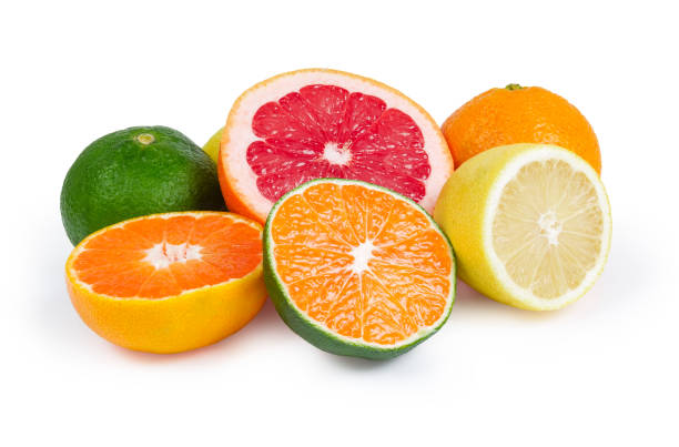 istock Whole and halves of various citrus on a white background 1057564650
