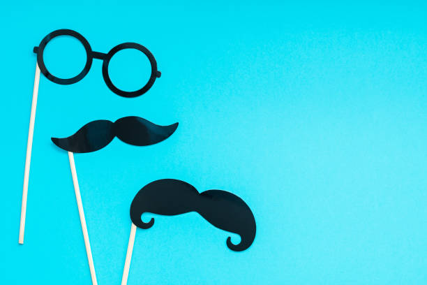 istock Paper moustaches for men fathers dad concept 1057565700