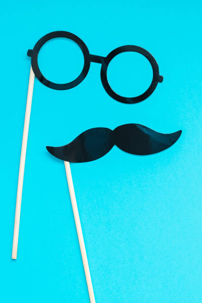 istock Paper moustaches for men fathers dad concept 1057565740