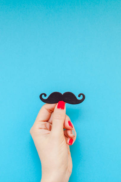 istock Paper moustaches for men fathers dad concept 1057566286