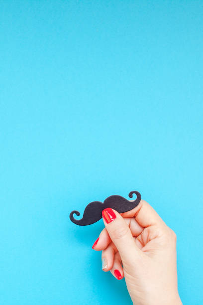 istock Paper moustaches for men fathers dad concept 1057566338