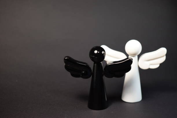 istock A white angel and a black angel 1057570484