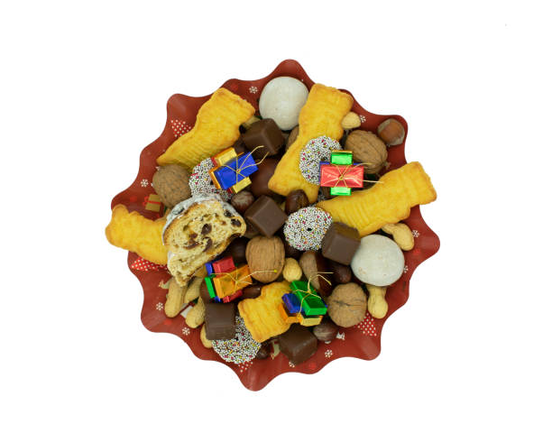 Christmas plate with stollen, cookies, chocolate and nuts
