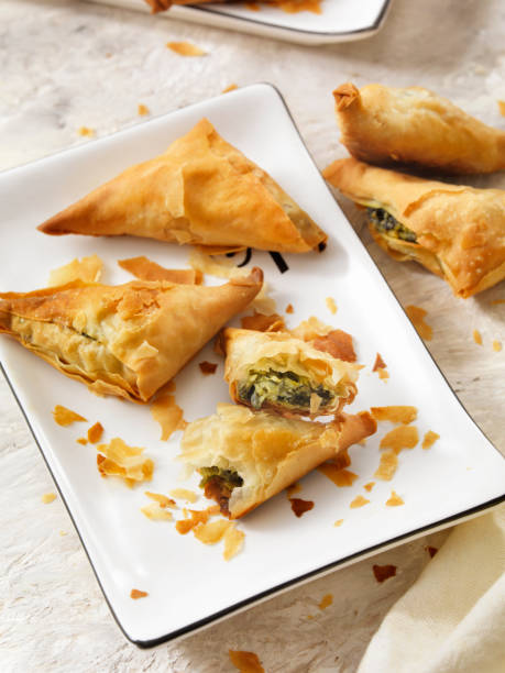 Spanakopita, Spinach and Feta in Filo Pastry Spanakopita, Spinach and Feta in Filo Pastry spanakopita stock pictures, royalty-free photos & images