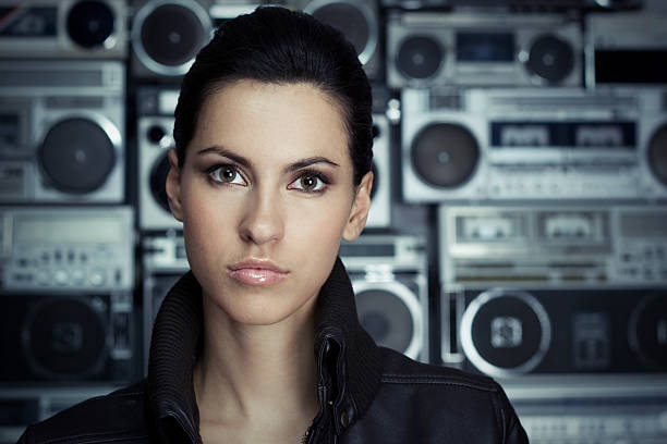 istock Beautiful woman with Boom Box background 105757856