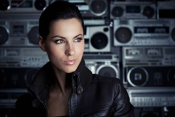 istock Beautiful rock woman with Boom Box background 105757867