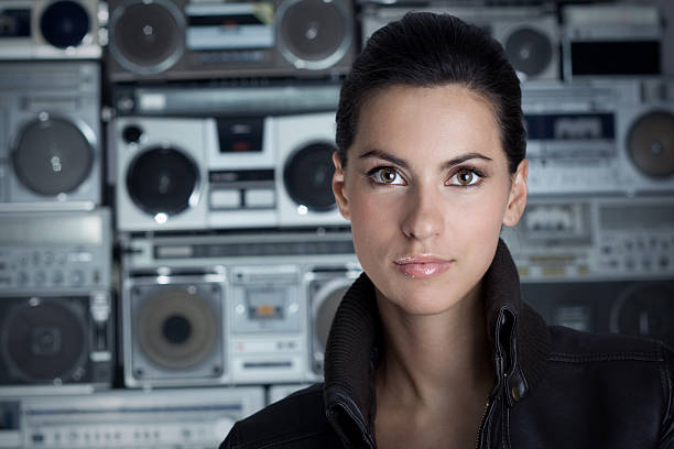 Beautiful rock woman with Boom Box background