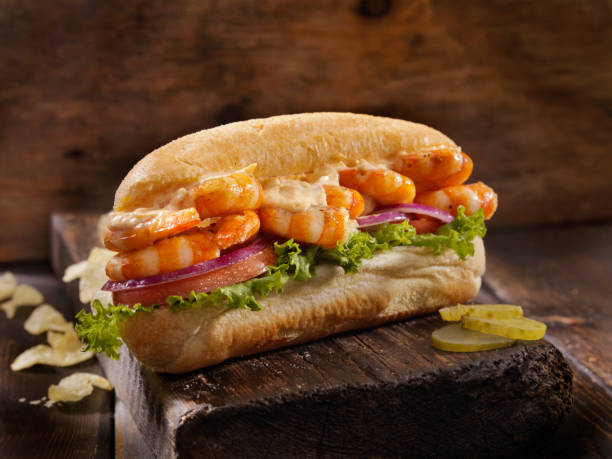 grilled shrimp po boy sub with spicy mayo - prepared shrimp prawn seafood salad imagens e fotografias de stock