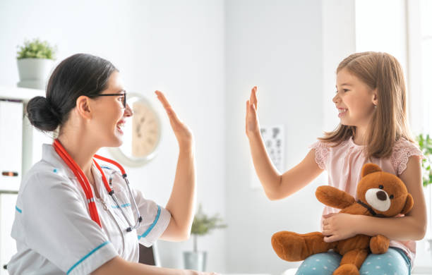 istock Doctor examining a child 1057581970