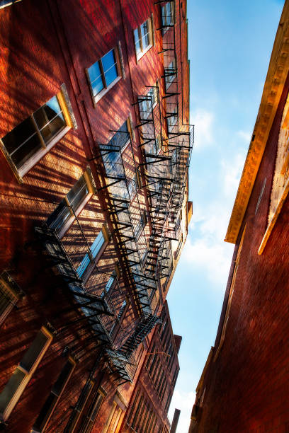 istock iron ladder on the wall of a tall building 1057591432