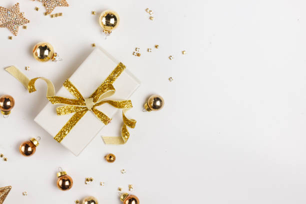 istock Christmas flat lay scene with golden decorations 1057594772