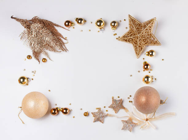 istock Christmas flat lay scene with golden decorations 1057604512