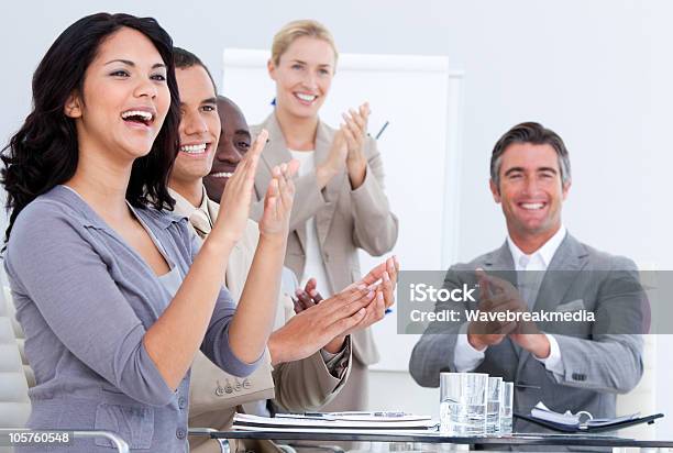 Cheerful Business People Applauding In A Meeting Stock Photo - Download Image Now - Adult, Applauding, Business