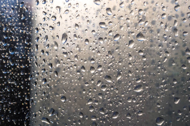istock background of raindrops on window glass, close up 1057605708
