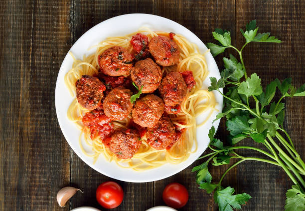 istock Meatballs and spaghetti on plate 1057606942
