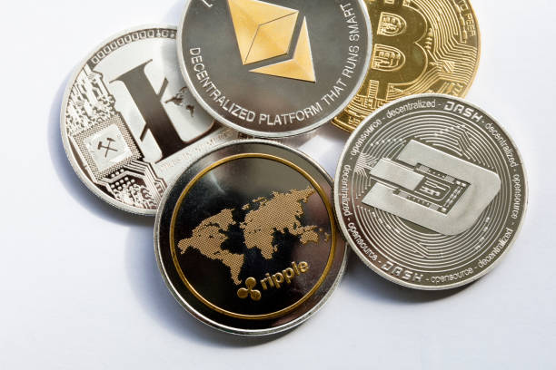 cryptocurrency: ethereum ripple litecoin bitcoin dash izmir, Turkey - October 21, 2018 Close up ethereum ripple litecoin bitcoin dash coins shot in white background in studio litecoin stock pictures, royalty-free photos & images