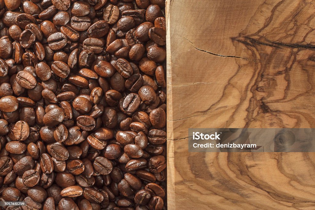 Coffee beans and wooden ground Above Stock Photo