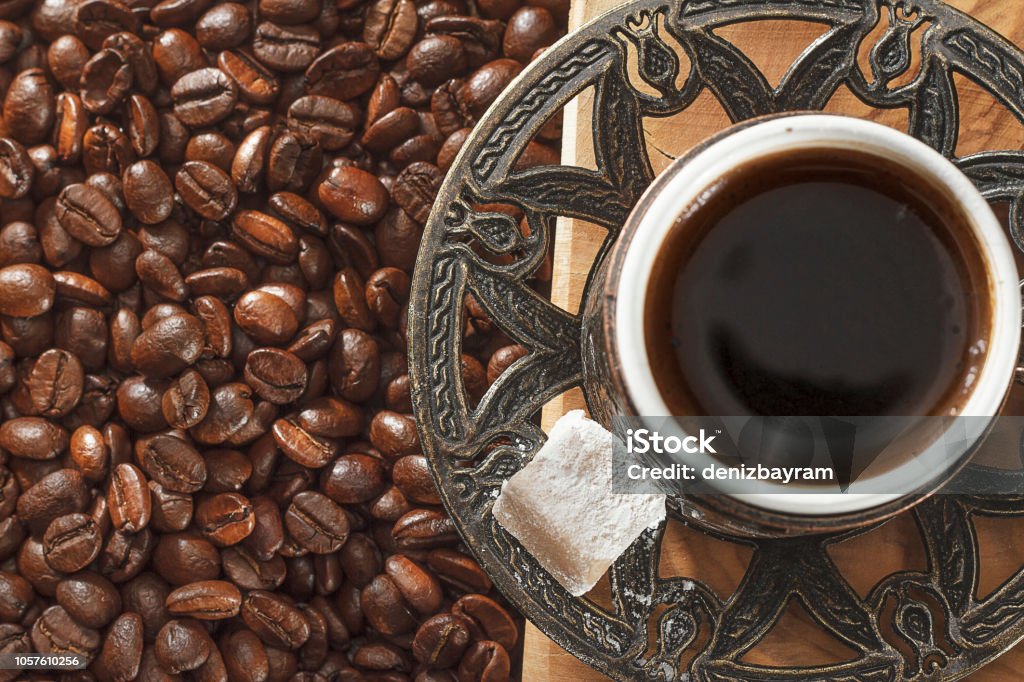 Turkish coffee cup and coffee beans on natural ground Coffee beans and coffee cup Above Stock Photo