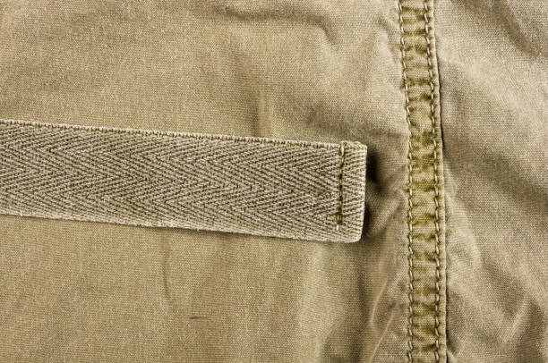 istock clothing items washed cotton fabric texture with seams 1057612988