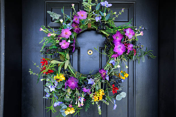 istock Floral Wreath on Wooden Door 105761877