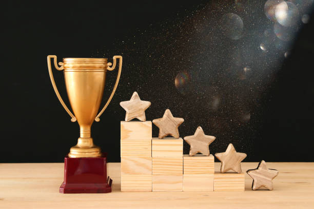 istock concept image of setting a five star goal. increase rating or ranking, evaluation and classification idea. 1057621338