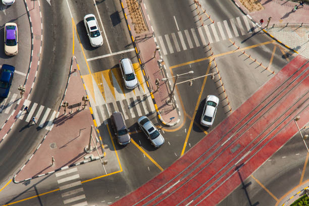 istock cars in intersection, city center 1057621398