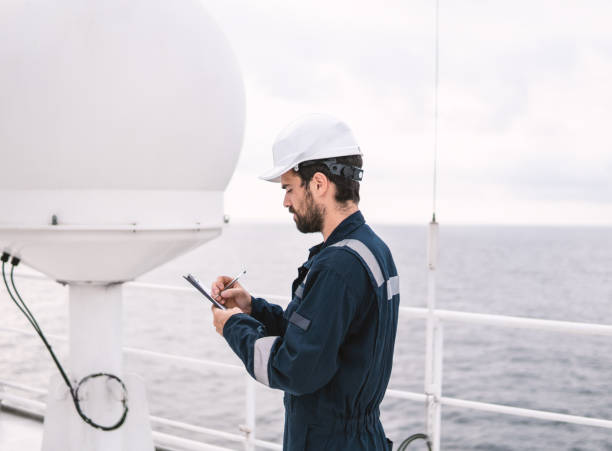 istock Service technician or serviceman near VSAT terminal 1057621578