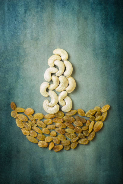 Diwali diya concept using Raisins and Cashew