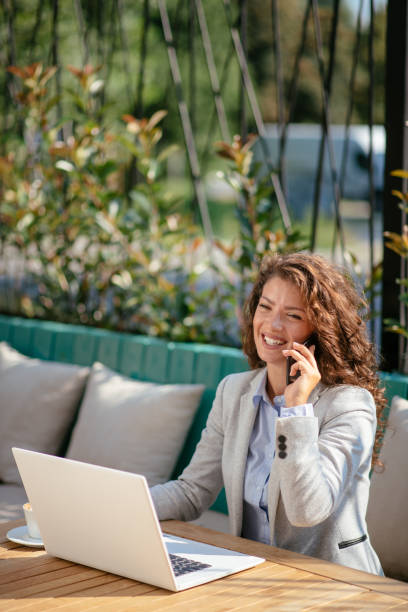 istock Business woman having coffee 1057623720
