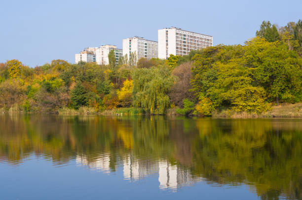 istock Urban Autumn landscape with trees in sunlight 1057624178