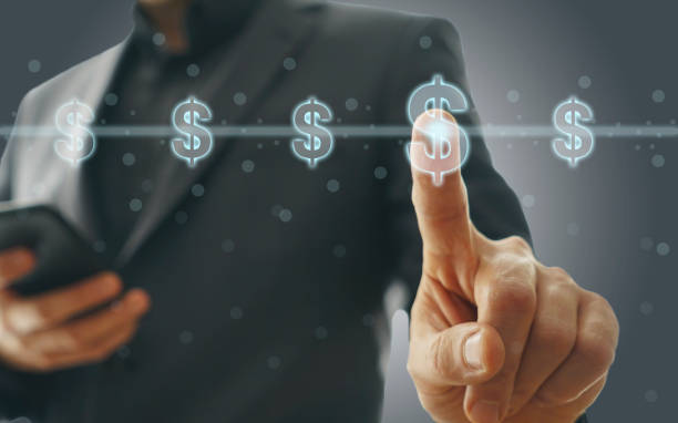 istock Businessman Pressing Dollar Symbol 1057627638