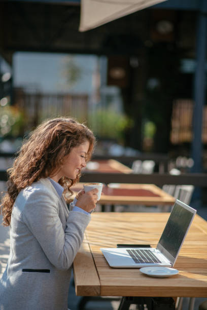 istock Business woman having coffee 1057628608