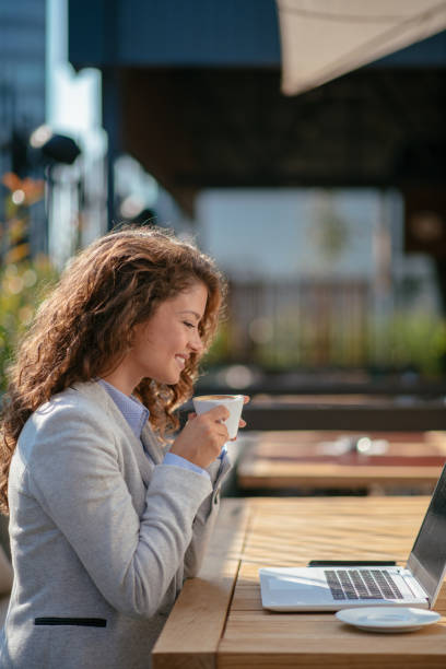 istock Business woman having coffee 1057628706