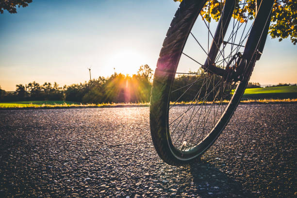 istock Autumn sunset with bike 1057628756