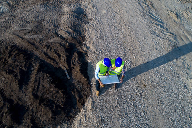 Top view of engineers at building site