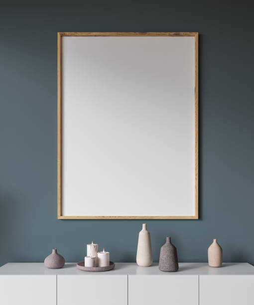 istock Vertical poster above white cabinet close up 1057635328