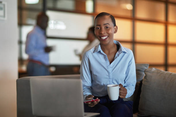 istock Portrait of smiling executive during coffee break 1057639214