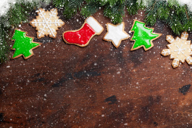 istock Christmas gingerbread cookies and fir tree 1057640292