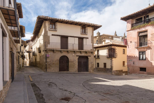 view of a central building from which two streets split
