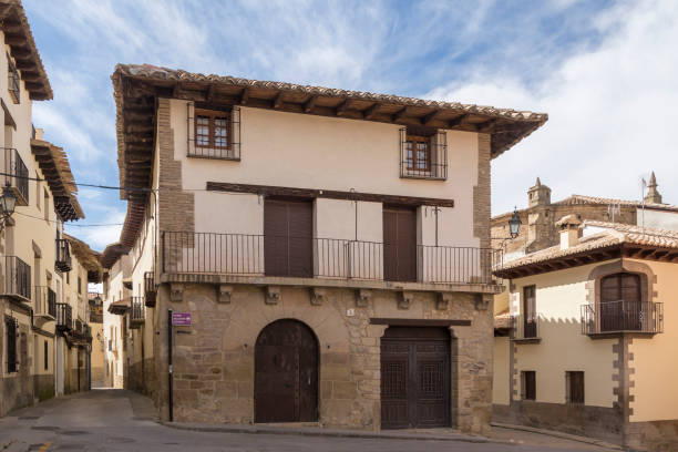 istock view of a central building from which two streets split 1057641588