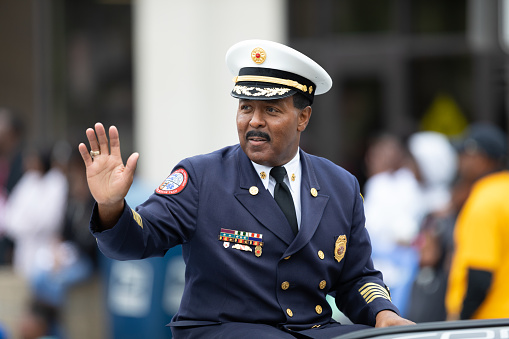 Indianapolis, Indiana, USA - September 22, 2018: The Circle City Classic Parade, Chief of the indianapolis Fire Department, on a car going down the road