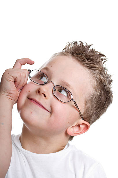 istock boy with smiling face wearing eyeglasses 105764778