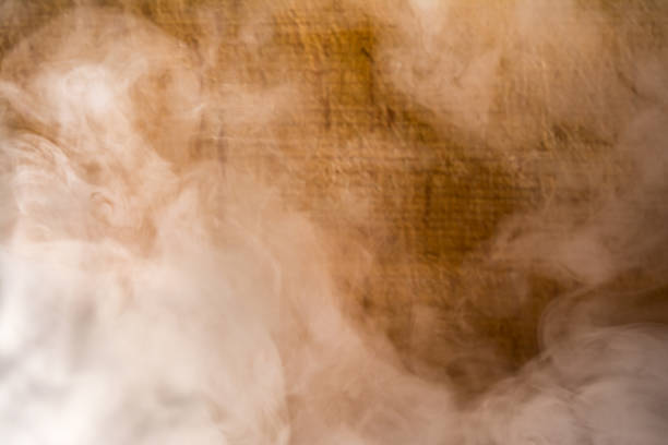 gray smoke on brown plank background, blurred abstraction background