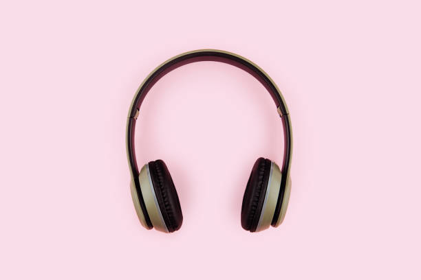 istock headphones on pink background. 1057653960