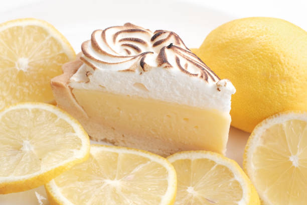 Lemon cheese tart on white background - Soft Focus