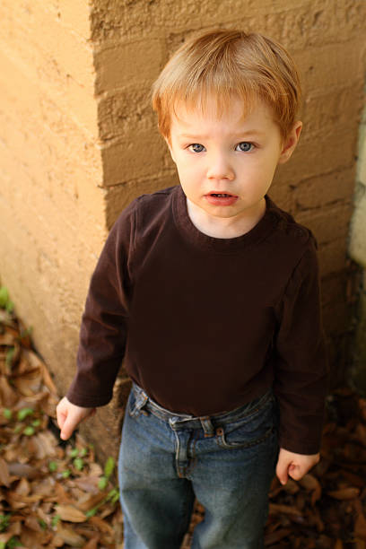 istock Red hair toddler not getting his way - mad 105765723