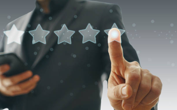 istock Businessman touching five stars 1057657320