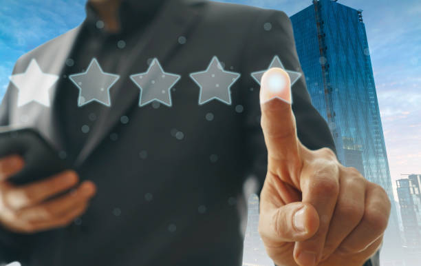 istock Businessman touching five stars 1057657348