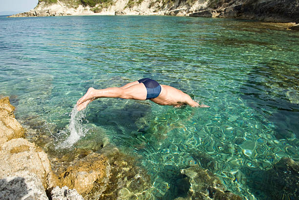 istock man diving into the sea 105765868